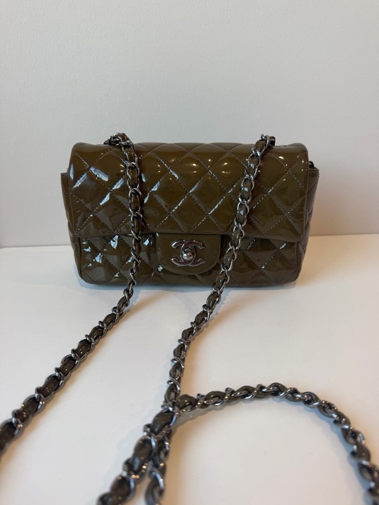 CHANEL Handbags - CHANEL Quilted Patent Leather Mini Flap Bag in Olive